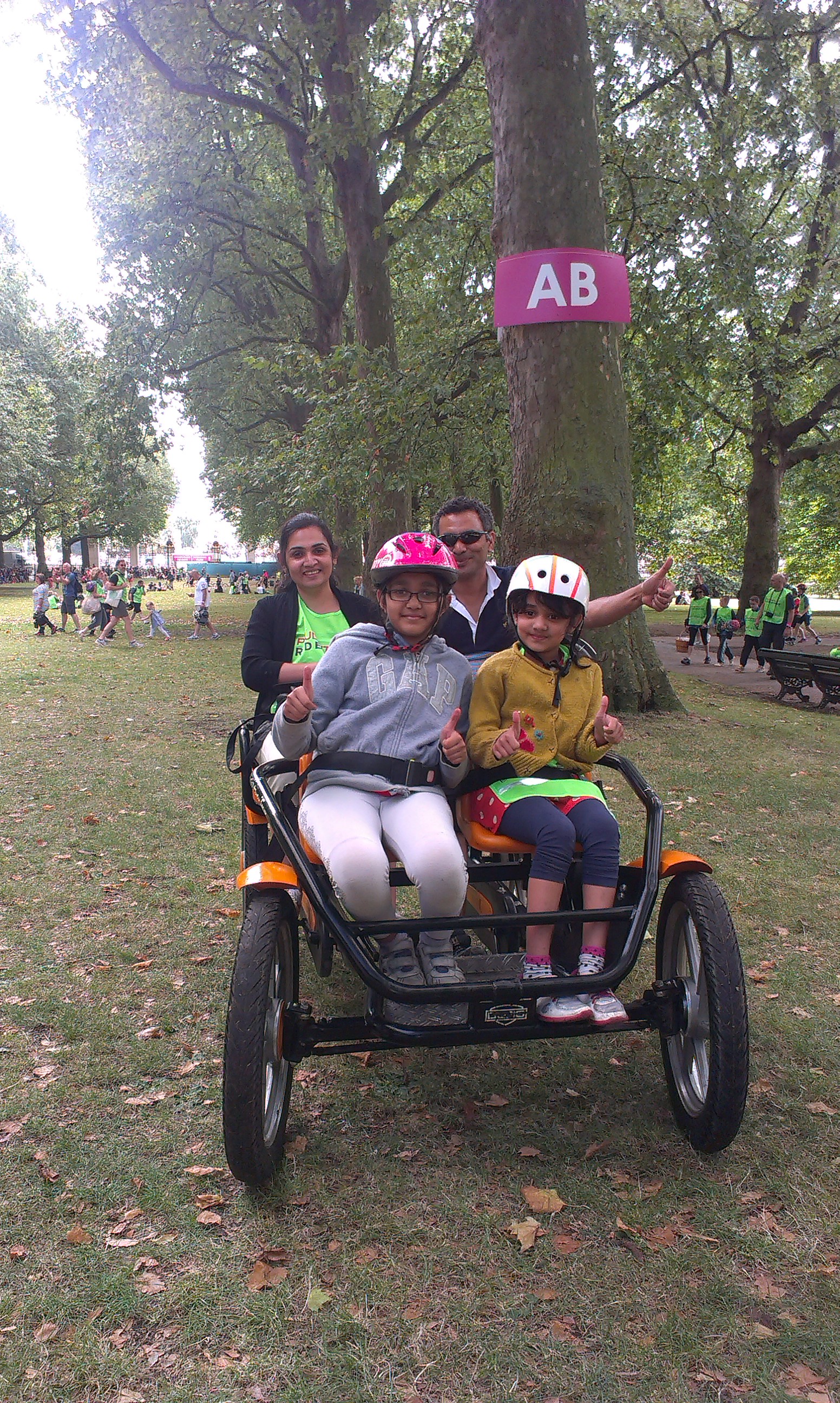 Two children enjoying the inclusive cycling at Green Park
